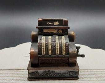 Miniature cash register, vintage cash register, antique die-cast metal pencil sharpener, antique cashier, collectible stationery