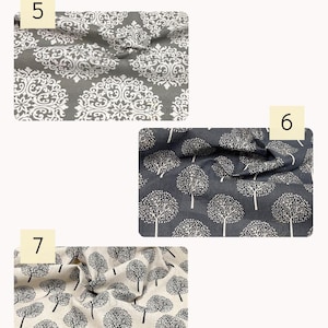 May include: Three fabric swatches labeled Linen Print. Number 5 is gray with a white damask pattern. Number 6 is dark charcoal with a white tree print. Number 7 is off-white with a black tree print. Each piece of fabric shows a folded texture.