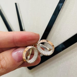 Ukrainian silver 925 and gold 375 earrings with zirconium. Ukrainian jewelry