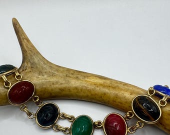 Bracciale vintage con scarabeo placcato oro: pietra preziosa onice nera