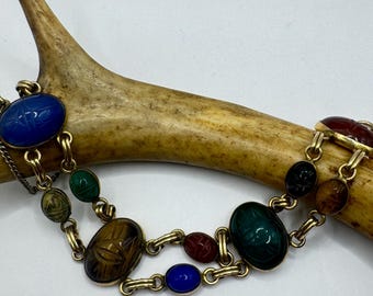 Bracciale vintage in oro con scarabeo e pietre preziose, placcato oro.