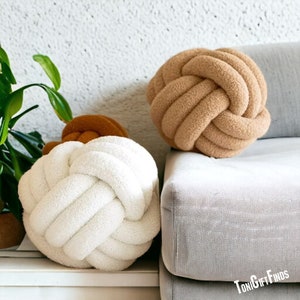 Gold clearance knot pillow