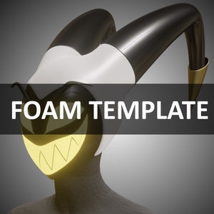 May include: A white and black foam mask with a yellow, toothy grin and two black horns. The text "FOAM TEMPLATE" is displayed on a black banner.