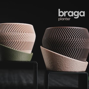 May include: Two Braga planters with a textured herringbone pattern. The left planter is light beige with an olive green base, and the right planter is dark brown with a light beige base. The text braga planter and h3liø design are visible.
