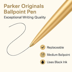 May include: A gold-colored Parker Originals Ballpoint Pen with a black ink line extending from the tip. The pen features a 1.0 mm medium ballpoint and is replaceable. Text on the image reads "Exceptional Writing Quality."