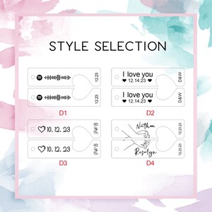 May include: Four different styles of personalized heart-shaped keychains. The first style features a Spotify logo and a barcode. The second style features the text "I love you" with a heart and the date "12.14.23". The third style features a heart and the date "10.12.23". The fourth style features a hand-drawn illustration of two hands holding each other with the names "Nathan" and "Rosalyn" written above.