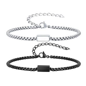 May include: Two stainless steel bracelets. One is silver-toned, the other is black. Each features a rectangular accent piece and a chain-link design. Both have adjustable clasps for a comfortable fit. These bracelets are suitable for everyday wear.