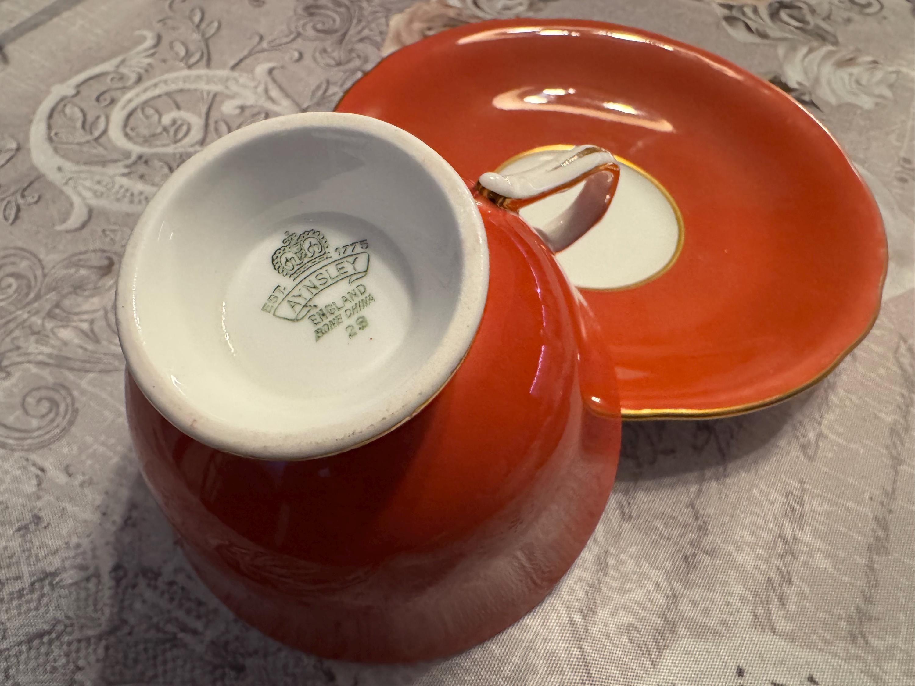 Vintage Aynsley Orange Teacup & Saucer – Pristine Floral Interior, Gold Trim Bone China England