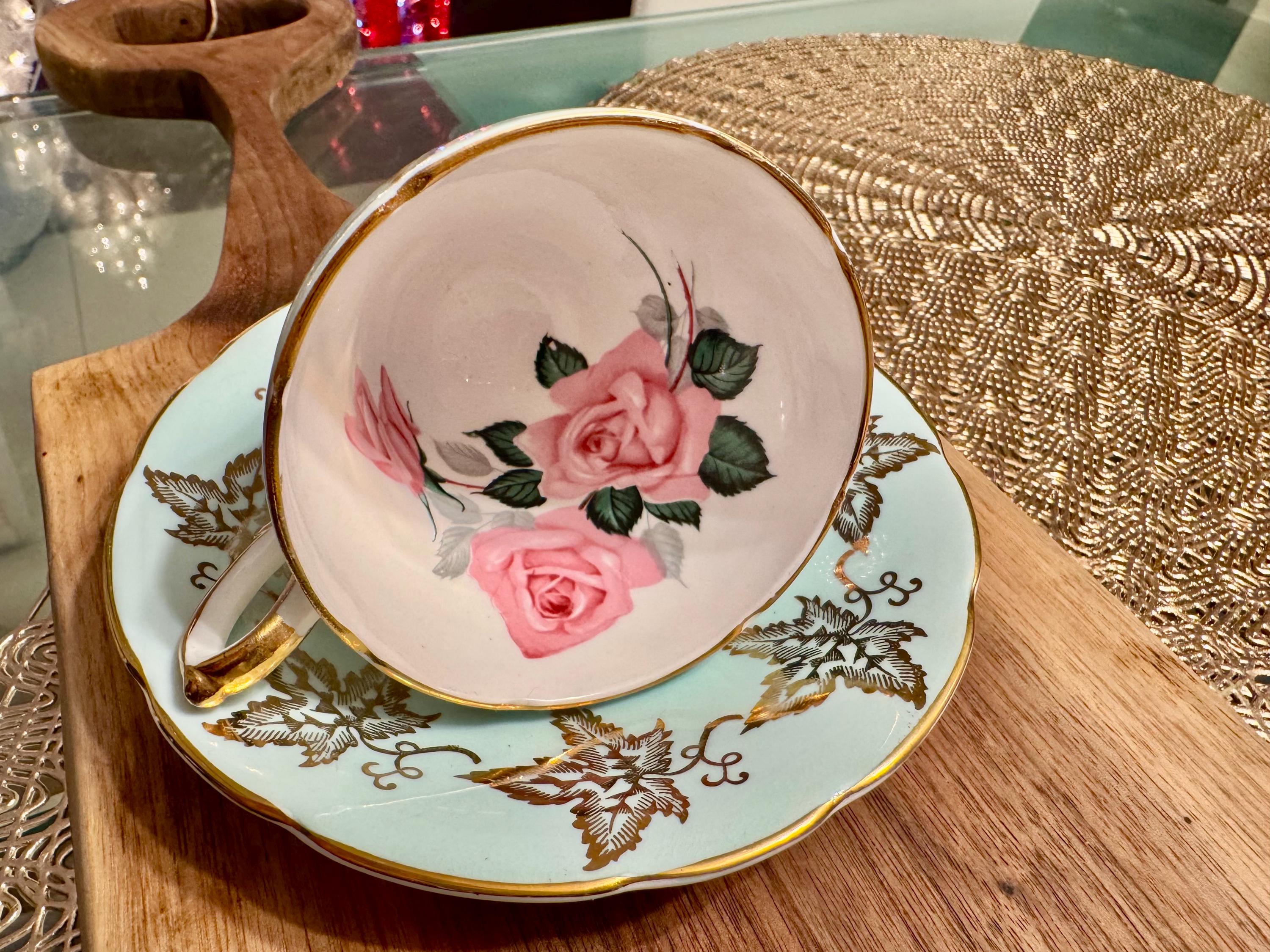 Vintage Sutherland Bone China Cup and Saucer: Pale Blue, Gold Leaves, Pink Roses