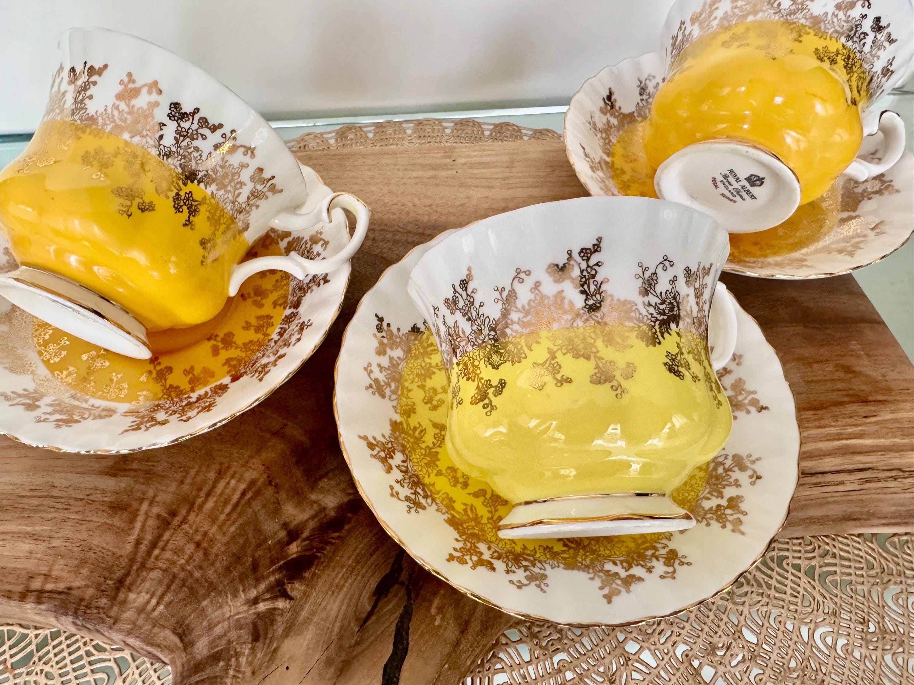 Exquisite Royal Albert Regal Series Cup and Saucer – Yellow and Gold Elegance