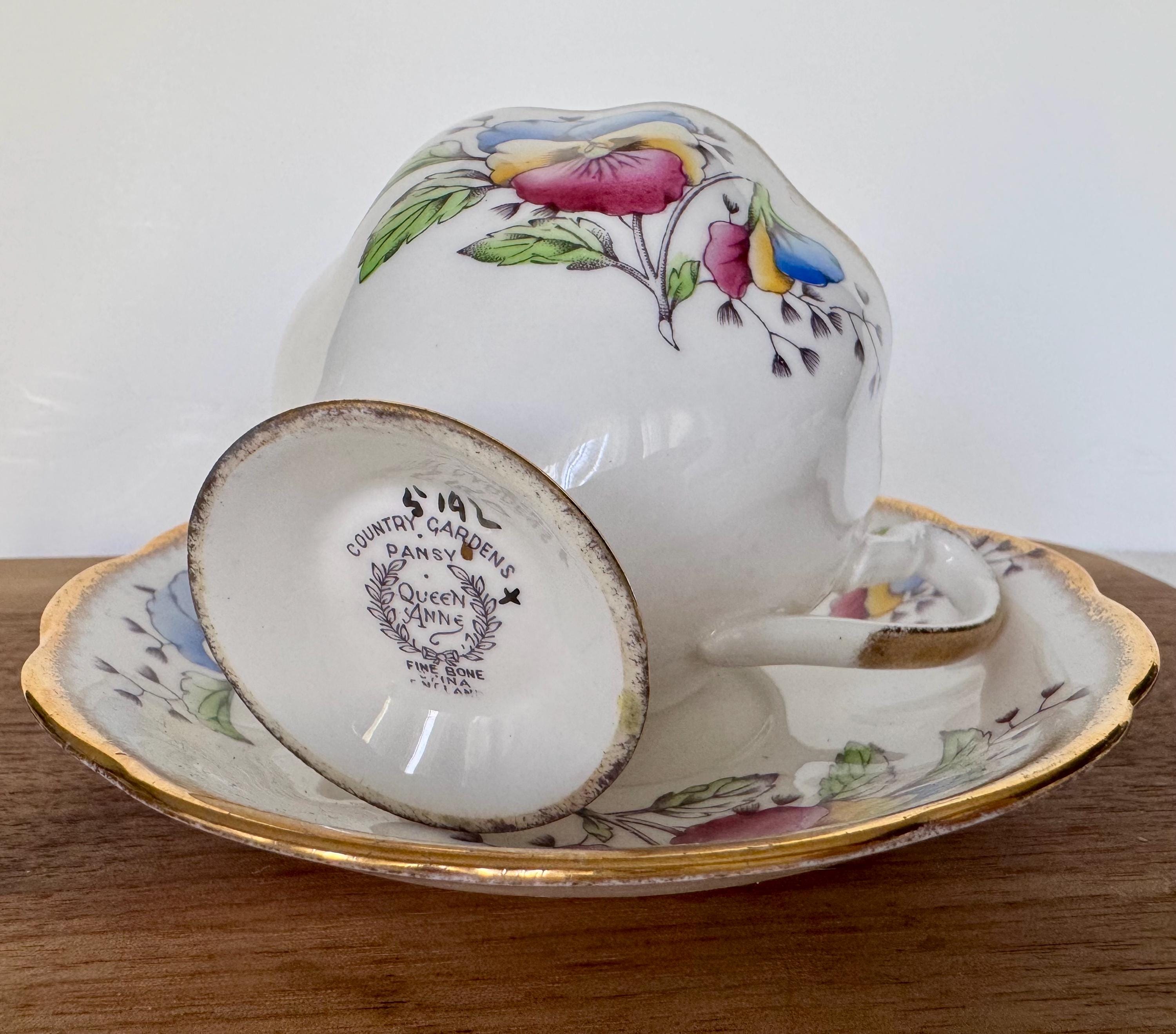 Vintage Queen Anne Teacup and Saucer – “Country Gardens: Pansy” – Multicolor Florals with Gold Trim