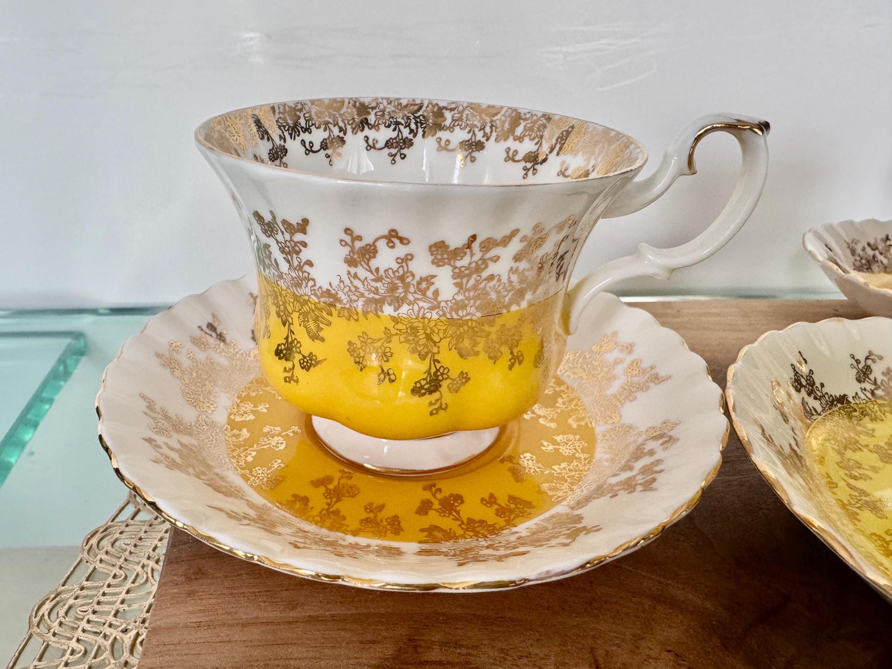 Exquisite Royal Albert Regal Series Cup and Saucer – Yellow and Gold Elegance