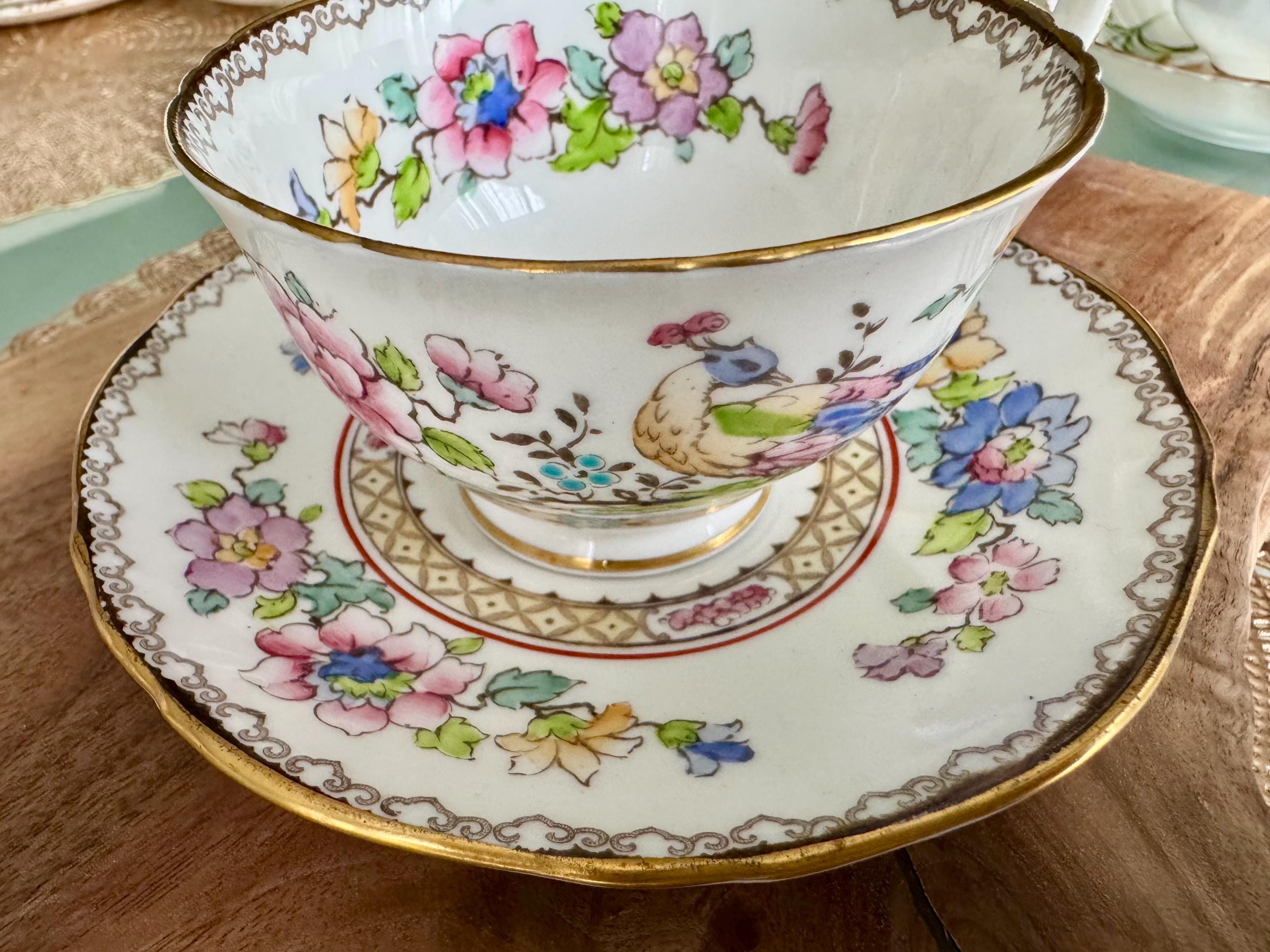 Vintage Crown Staffordshire Cup & Saucer - Hand-Painted Peacock Floral Design