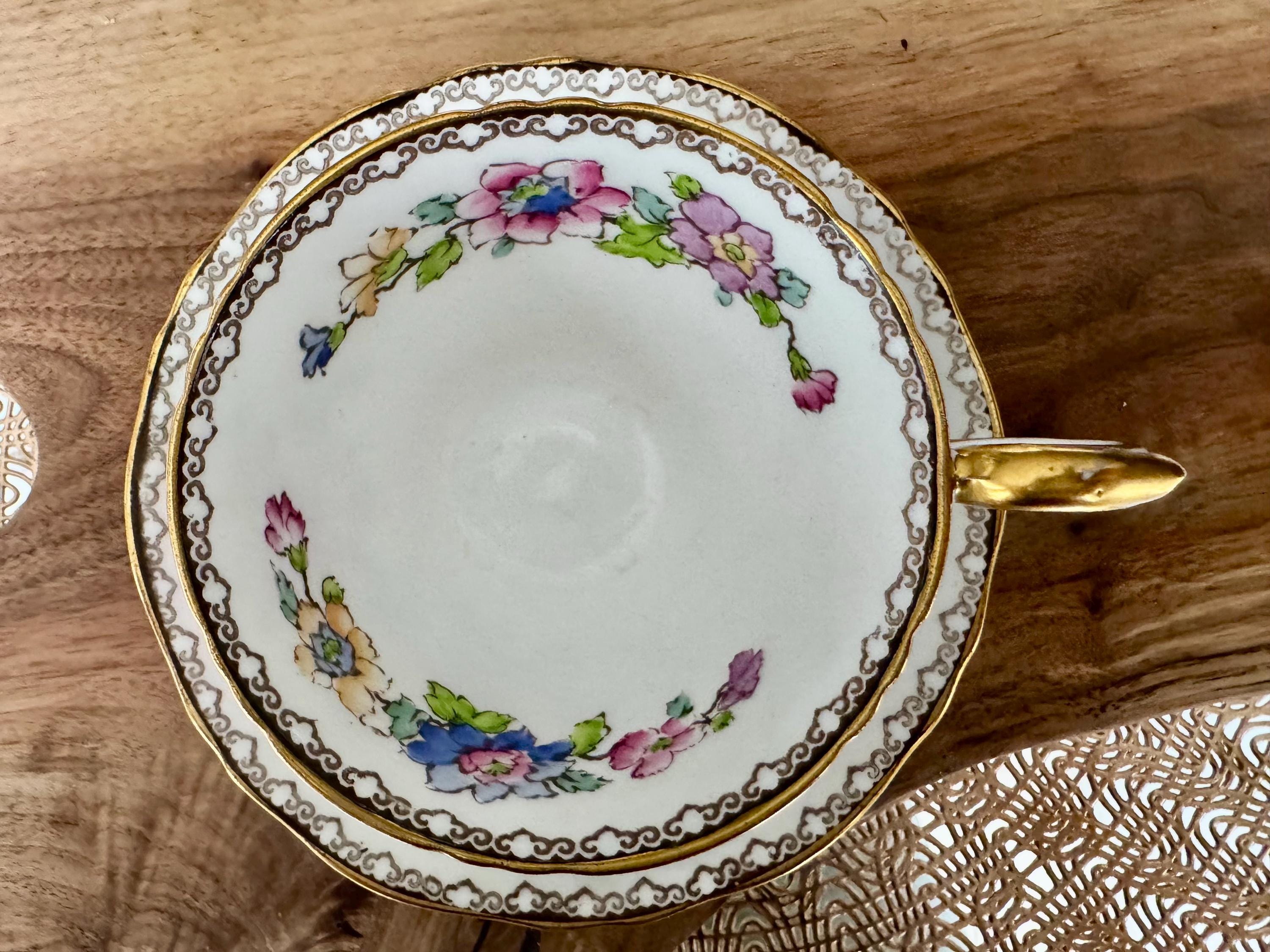 Vintage Crown Staffordshire Cup & Saucer - Hand-Painted Peacock Floral Design
