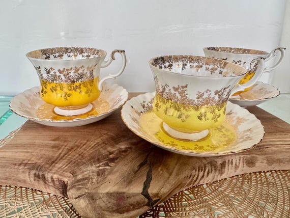 Exquisite Royal Albert Regal Series Cup and Saucer – Yellow and Gold Elegance