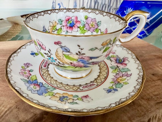 Vintage Crown Staffordshire Cup & Saucer - Hand-Painted Peacock Floral Design