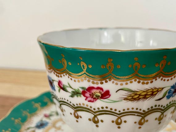Vintage England Fine Bone China Cup and Saucer: Floral Gold Trim