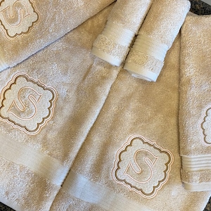 Towels monogrammed, embossed, embroidered.  Towel sets for wedding gifts, house warming gifts, showers.Bath, hand, & washcloths personalized