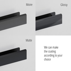 May include: Three black metal drawer pulls shown in different finishes labelled Moire, Glossy, and Matte. The text states: We can make the coating according to your choice. Each handle features a long, rectangular, flat front profile with rounded edges.