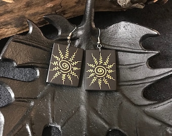 Handmade rectangular black wooden earrings with gold “sun spiral” pattern, very light black and gold earrings