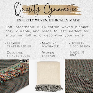 May include: A folded, cream-colored woven blanket with a black fringe, displayed on a white background. The blanket is made of 100% cotton and has colorful fringed edges. The image also includes text that reads "Quality Guarantee" and "Made in USA."