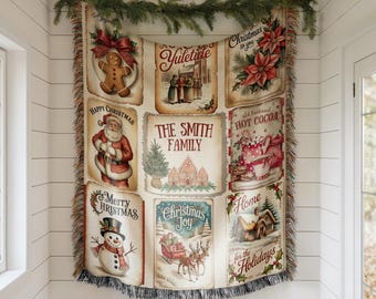 May include: A Christmas-themed tapestry with various vintage-style illustrations. The tapestry features images of Santa Claus, a snowman, gingerbread man, and festive phrases like "Happy Christmas" and "Christmas Joy". The central panel reads "The Smith Family".