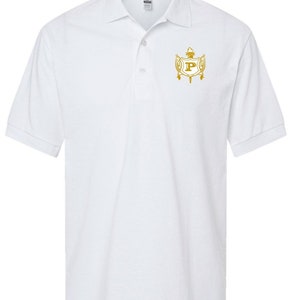 May include: White polo shirt with a gold embroidered crest featuring a letter "P" surrounded by a design of a torch, wings, and a crown.