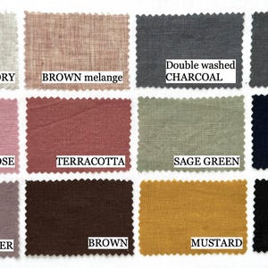 May include: A collection of fabric swatches in various colors, including ivory, brown melange, dusty rose, terracotta, sage green, navy blue, dusty lavender, brown, mustard, and black. Each swatch has a scalloped edge and a label with the color name.