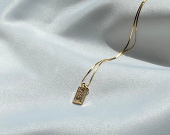 Elegante collar de oro con lingotes de 9 quilates