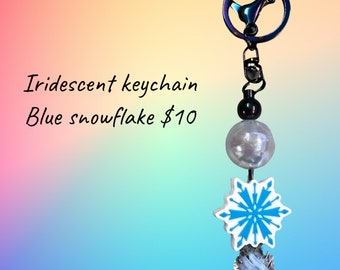 Iridescent keychain with blue snowflake