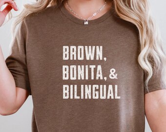 May include: A brown t-shirt with the text "BROWN, BONITA, & BILINGUAL" printed in white.