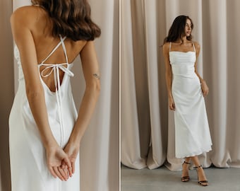 White silk slip dress with cowl neck and open back. Bridesmaids white backless silk dress. Satin midi dress with spaghetti straps.