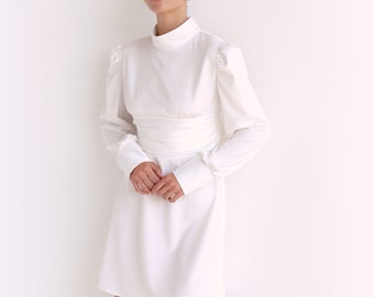 White satin mini dress SARAH with open back. Turtleneck backless silk dress with circle skirt and long puff sleeves. Satin event dress.