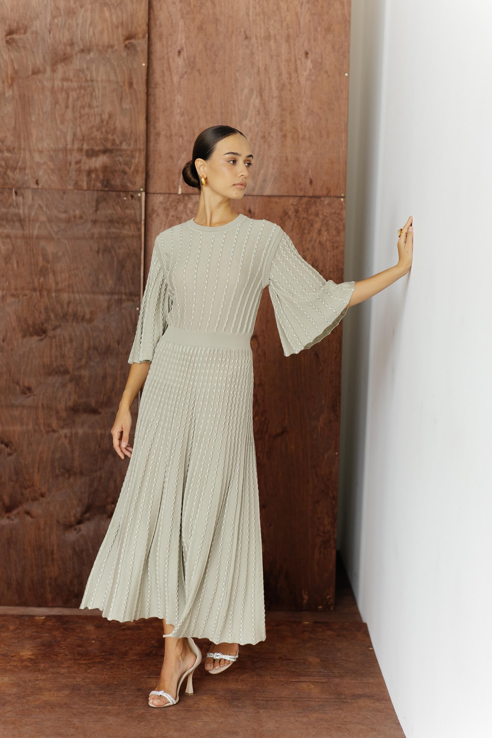 dkny black white dress Drop Waist Midi Shirt vietnamese student ao dai inspired look.Fabrication Size:40 - READY TO SHIP A close up of