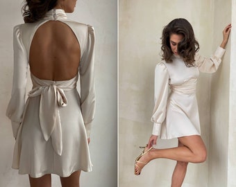 Ivory stunning mini dress with open back. Turtleneck backless silk dress with circle skirt and long puff sleeves. Satin event dress.