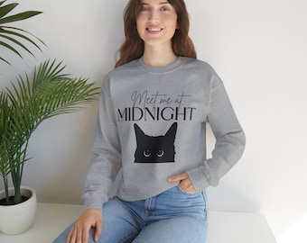 May include: A grey sweatshirt with a black cat silhouette and the text "Meet me at MIDNIGHT".