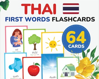 May include: A set of 64 Thai language flashcards for learning first words. The flashcards feature colorful illustrations of common objects, animals, and concepts, with the Thai word and English translation written below each image. The cards are designed to help children learn basic Thai vocabulary.