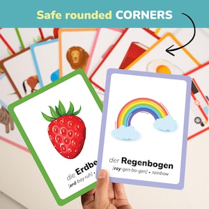 Durable German flashcards for toddlers with safe rounded corners and thick laminated finish. Double-sided cards include German and English words, plus pronunciation support. Fun and educational way to introduce your child to new vocabulary and bilingual learning at home or in preschool.
