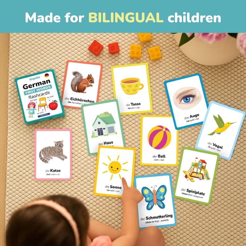 Child learning German using bilingual flashcards. Perfect for toddlers and preschoolers to explore first words visually through colorful illustrations. Educational German learning cards help kids connect objects with words naturally. Great teaching resource for parents, teachers, and homeschool learning activities.