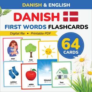 Pode incluir: Flashcards para aprender as primeiras palavras em dinamarquês. Os cartões apresentam ilustrações coloridas de uma mãe e um bebê, uma árvore, um sol sorridente, meias, uma maçã vermelha, o céu e uma casa. 64 cartões.
