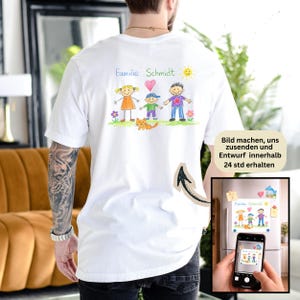 May include: White t-shirt with a colorful, hand-drawn family portrait and the name "Familie Schmidt" above the illustration. The design includes a sun, flowers, and a cat. The shirt also has text in German.