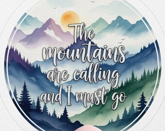 May include: A round sticker with a watercolor mountain scene in shades of blue, green, and purple. The text "The mountains are calling and I must go" is written in a script font. The sticker is held by a hand.