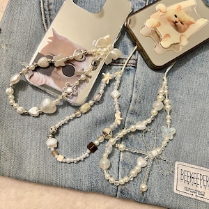 Weiß handgefertigt Stern Schleife Flügel Blume Perle Schmetterling Handy Charme Kawaii Handy Hülle Lanyard Armband Handy Schnur Herz Charme Geschenk für sie