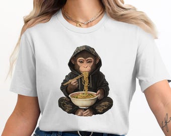 Camiseta gráfica de mono comiendo fideos: diseño animal de moda