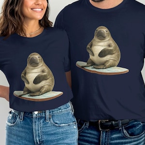 Manatee Surfing T-Shirt, Cute Sea Cow Tee, Marine Animal Design, Funny Ocean Lover Gift, Unique Graphic Shirt, Trendy T-Shirt