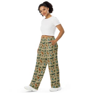 May include: Wide-leg pants with a beige background and a colorful pattern of butterflies, dragonflies, and beetles.