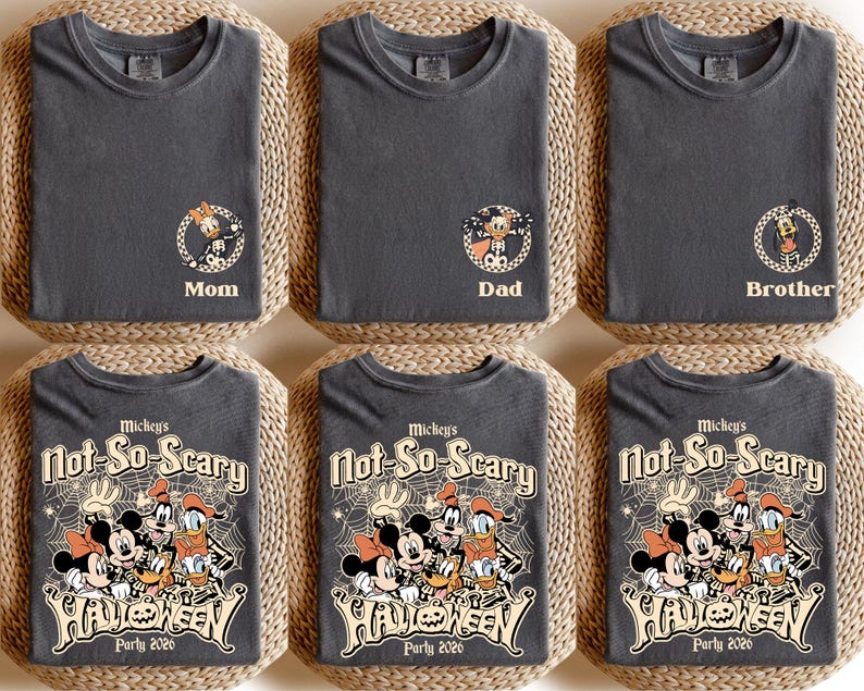 May include: Six dark gray t-shirts with Halloween-themed designs. Three shirts have character graphics with "Mom", "Dad", and "Brother" labels. The other three shirts feature a graphic of Mickey Mouse and friends with "Mickey's Not-So-Scary Halloween Party 2020" text.