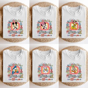 May include: White t-shirts featuring various Disney characters, including Mickey Mouse, Minnie Mouse, Pluto, Donald Duck, Daisy Duck, and Goofy. Each shirt has a colorful graphic with the text "Walt Disney World".