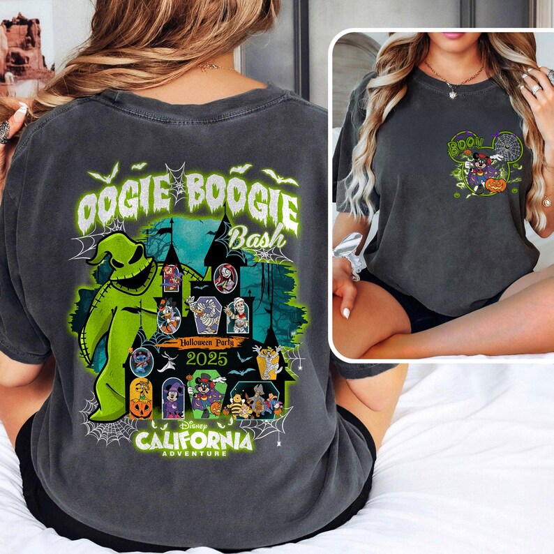 May include: Dark gray t-shirt featuring a graphic for the Oogie Boogie Bash Halloween Party 2025 at Disney California Adventure. The design includes the Oogie Boogie character, other Disney characters, and the text "Oogie Boogie Bash".