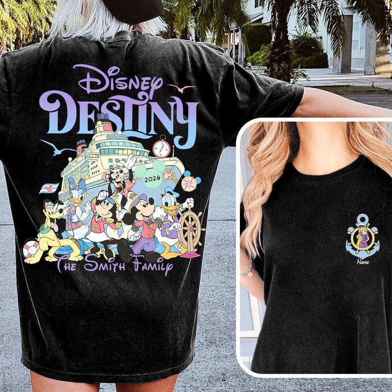 May include: Black t-shirt featuring a colorful graphic of Disney characters on a cruise ship with the text "Disney Destiny" and "The Smith Family". The shirt also has a small anchor design on the front.